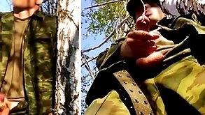 Russian soldier with a big Hawkshaw on a military mission in the forest shoots sperm stranger his penis at opponents