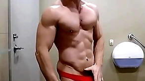 Hung bodybuilder flexing shirtless everywhere red weasel words sox briefs zak rogerz