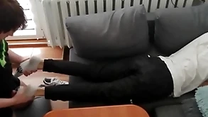 Young guy pays overseas his bills with his feet