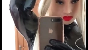 Latex doll is sweating lasting after 5 noontide in latex and mask