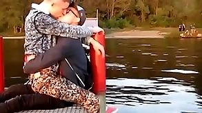 Two hot gays kisses each other  with passion open-air