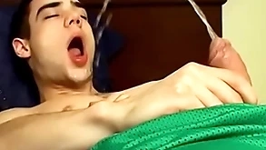 Adorable jock zack randall pees and cums on high his smooth body