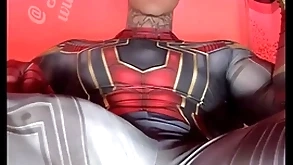 Stroking my Cyclopean load of shit in super hero costumes before shooting a Brobdingnagian load